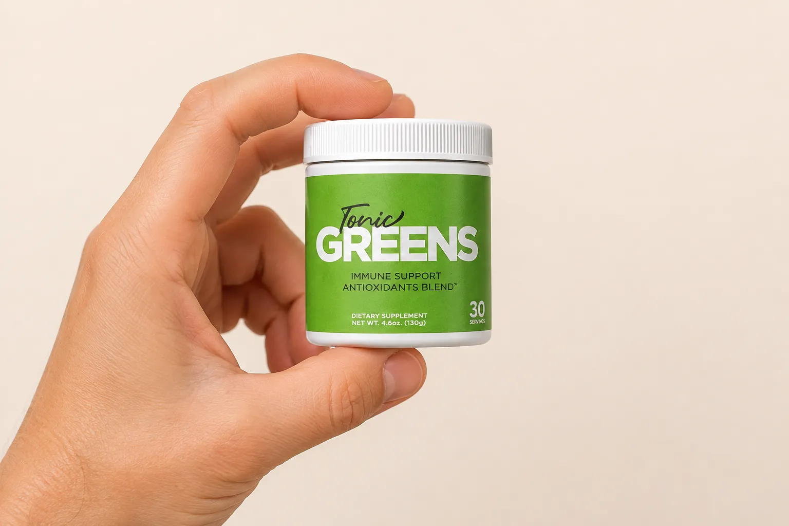 TonicGreens — the package held in a hand